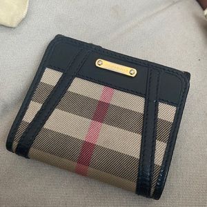 Authentic Burberry trifold check pattern wallet.